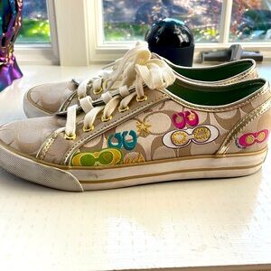 Coach Leather Ware sneaker. Tan with gold outline. Like new . Size 7